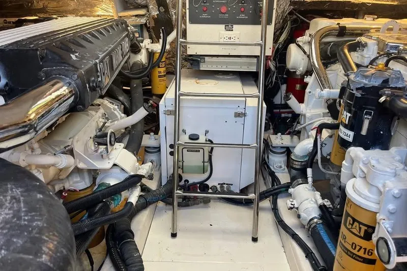 Slide: The Image of Engine room of a 2002 Tiara Yachts 4300 Open, showcasing machinery and components. - 26