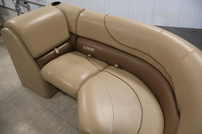 Slide: The Image of Beige and brown seating on 2021 Lowe SS 230 WT boat. - 12