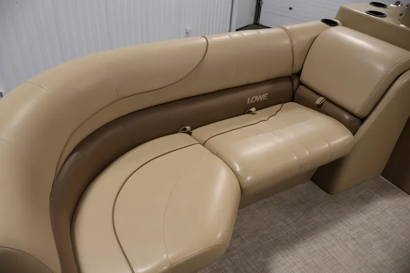 Slide: The Image of 2021 Lowe SS 230 WT boat interior with beige leather seating. - 15