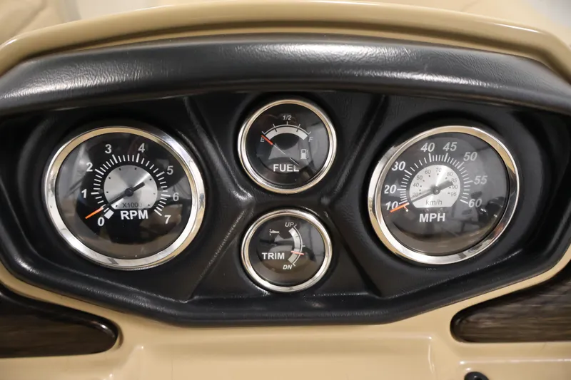 Slide: The Image of Dashboard of 2021 Lowe SS 230 WT boat with RPM, fuel, and speed gauges. - 22