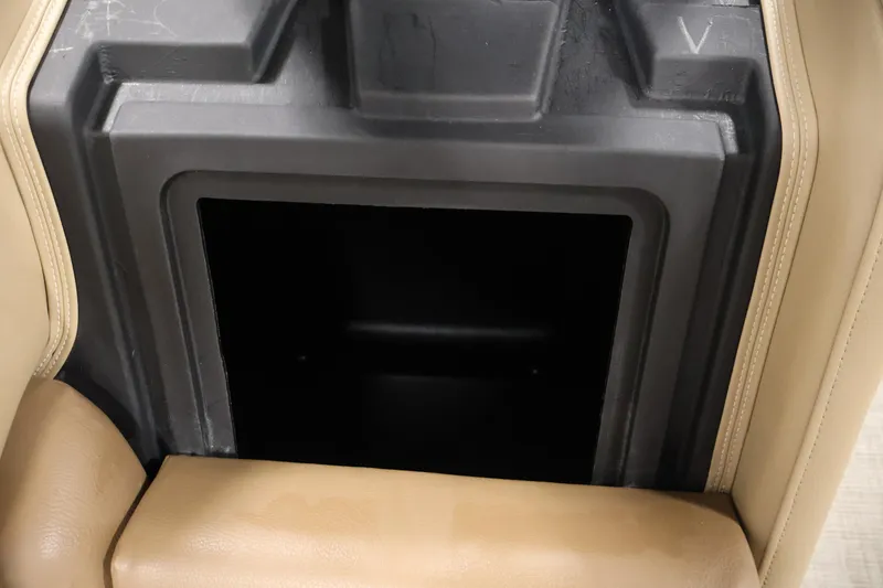 Slide: The Image of Storage compartment in 2021 Lowe SS 230 WT boat with beige seating. - 32