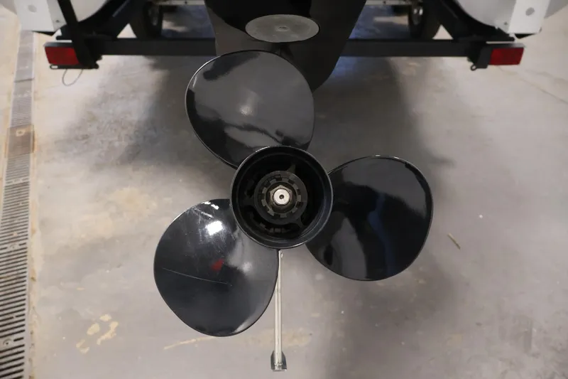 Slide: The Image of Propeller of a 2021 Lowe SS 230 WT boat on a trailer. - 43