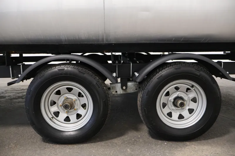 Slide: The Image of 2021 Lowe SS 230 WT trailer wheels on concrete surface. - 47