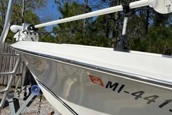 Slide: The Image of 2006 Clearwater 2100 boat on trailer, close-up view of hull and registration number. - 3