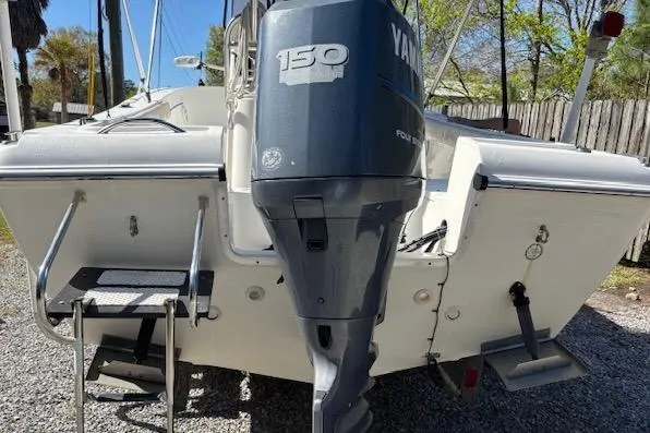 Slide: The Image of 2006 Clearwater 2100 boat with Yamaha 150 outboard motor, rear view. - 9