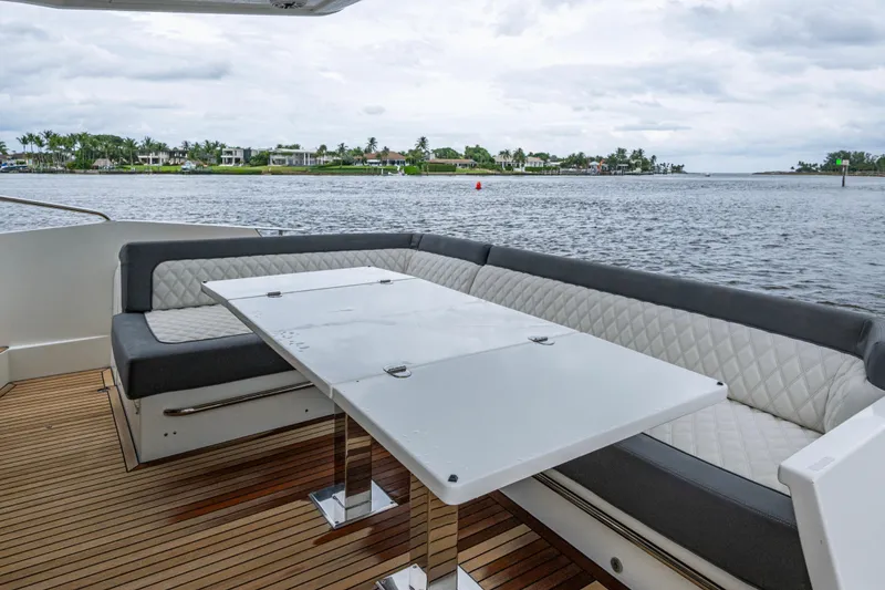 Slide: The Image of Luxury seating area on 2020 Galeon 550 Fly yacht with waterfront view. - 22