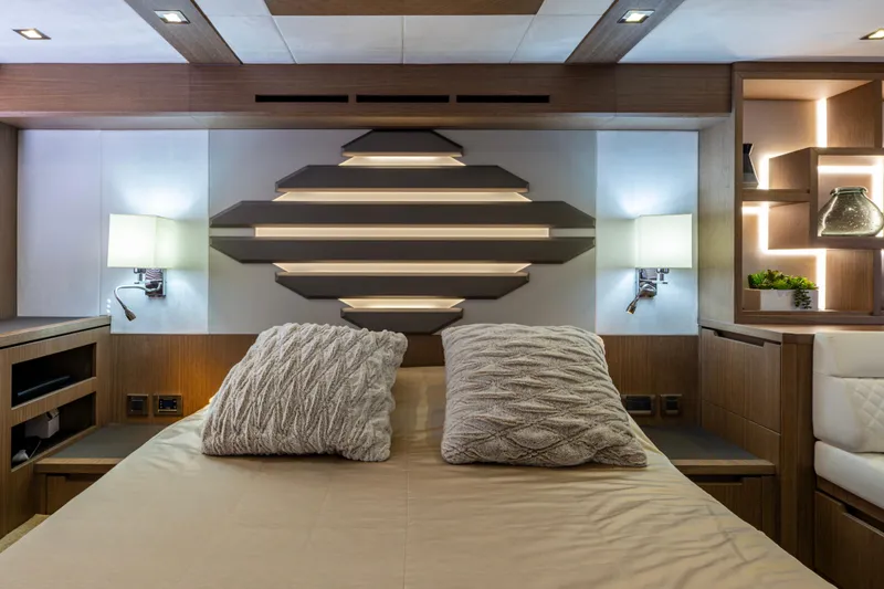 Slide: The Image of Luxurious Galeon 550 Fly 2020 yacht bedroom with modern design and cozy lighting. - 27