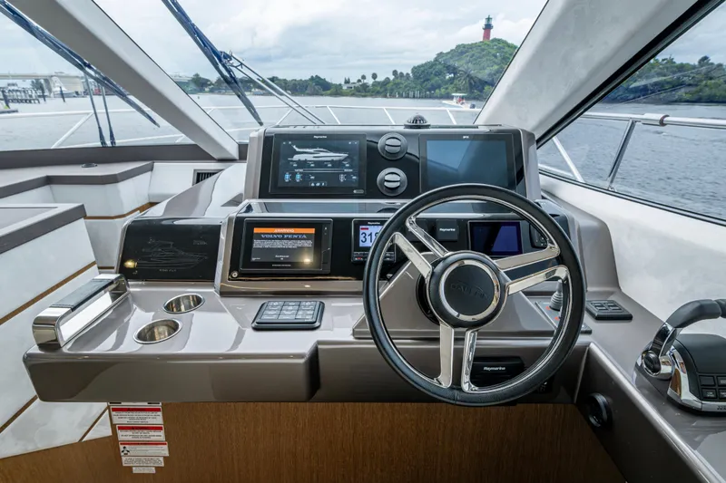 Slide: The Image of Helm of 2020 Galeon 550 Fly yacht with advanced navigation systems. - 3