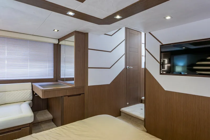 Slide: The Image of Luxurious interior of 2020 Galeon 550 Fly yacht with modern wood paneling and sleek design. - 31