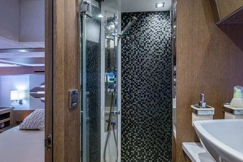 Slide: The Image of Luxurious bathroom interior of 2020 Galeon 550 Fly yacht with modern shower and sink. - 32