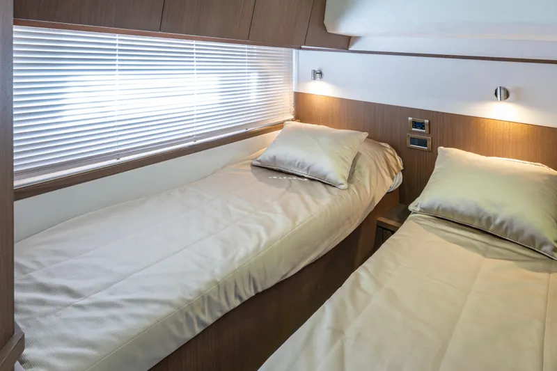 Slide: The Image of Luxurious twin cabin interior of 2020 Galeon 550 Fly yacht. - 35