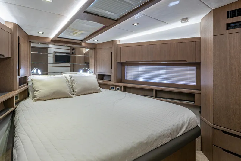 Slide: The Image of Luxurious bedroom interior of 2020 Galeon 550 Fly yacht with modern wood finishes. - 36