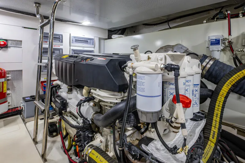 Slide: The Image of Engine room of 2020 Galeon 550 Fly yacht, featuring advanced machinery and equipment. - 41