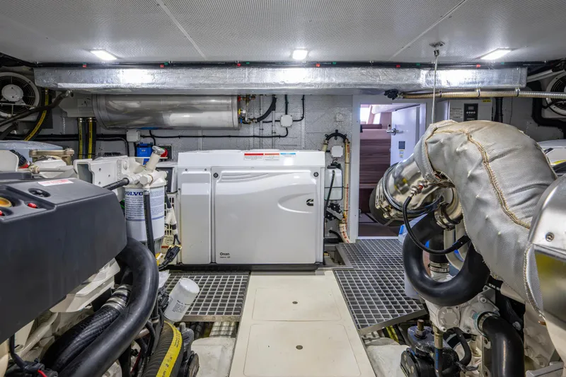 Slide: The Image of Engine room of 2020 Galeon 550 Fly yacht, featuring advanced machinery and equipment. - 45