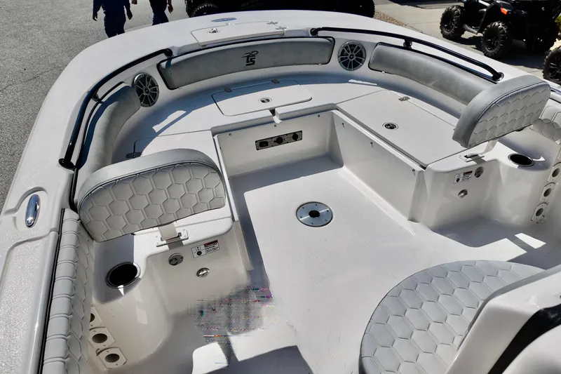 Slide: The Image of 2026 Carolina Skiff 21 Ultra Elite boat interior with seating and storage compartments. - 11