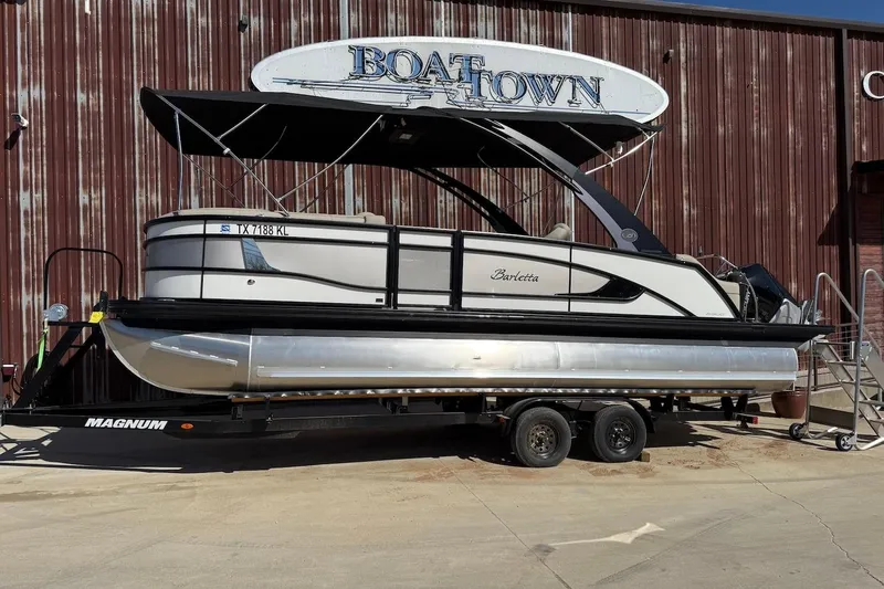 The Image of 2022 Barletta L23UCA pontoon boat on trailer at Boat Town dealership. - 0