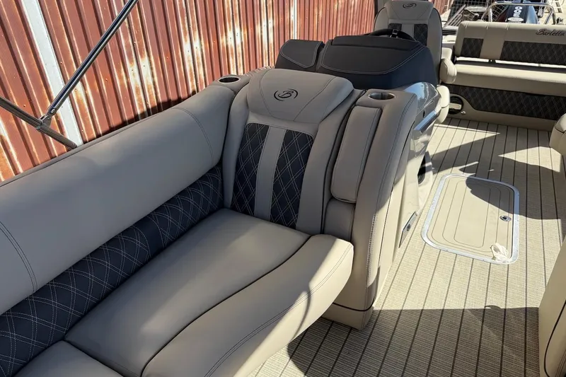 Slide: The Image of 2022 Barletta L23UCA pontoon boat interior with luxurious seating and elegant design. - 14