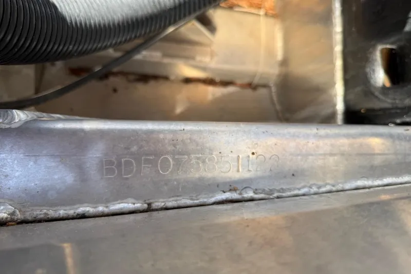 Slide: The Image of Close-up of a 2022 Barletta L23UCA serial number engraved on metal. - 21