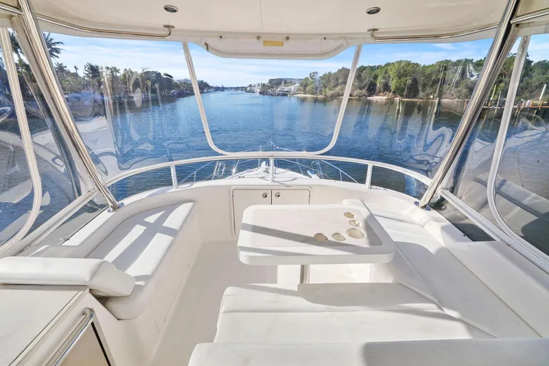 Slide: The Image of 2016 Riviera 43 Open Flybridge yacht interior with scenic waterway view. - 23