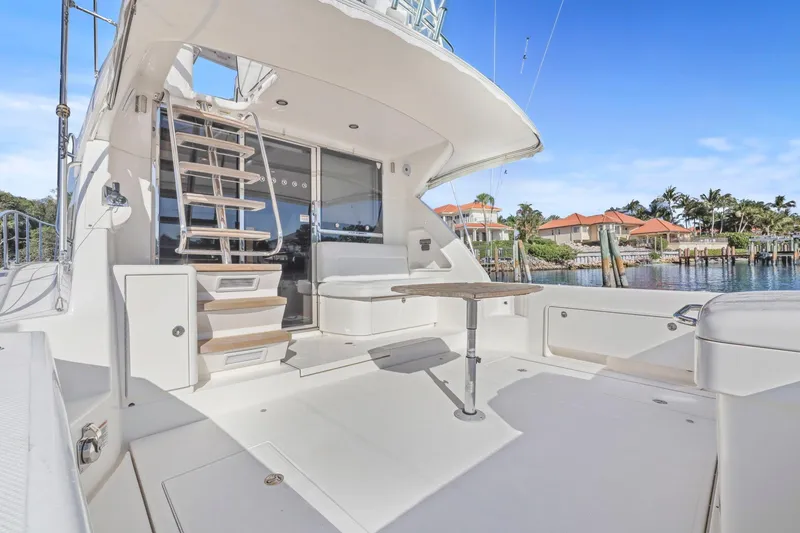 Slide: The Image of 2016 Riviera 43 Open Flybridge yacht with spacious deck and modern design. - 27