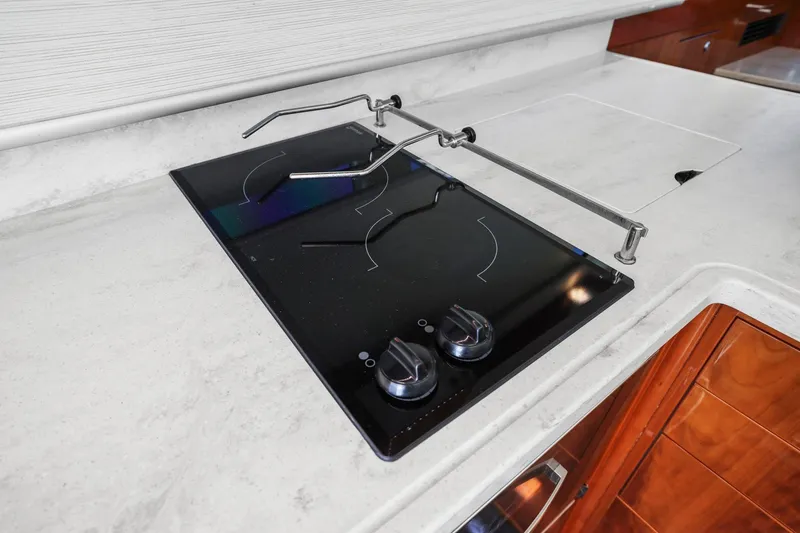 Slide: The Image of Modern stovetop in 2016 Riviera 43 Open Flybridge yacht kitchen. - 33