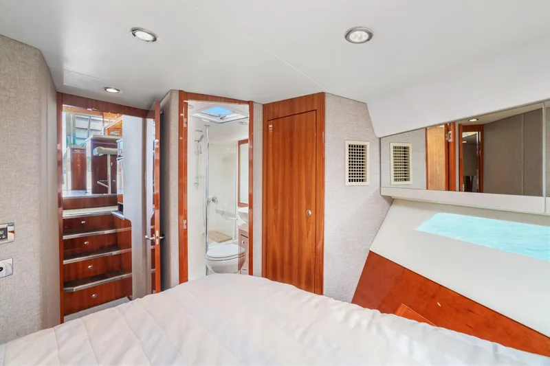 Slide: The Image of Luxurious interior of 2016 Riviera 43 Open Flybridge yacht cabin with ensuite bathroom. - 40