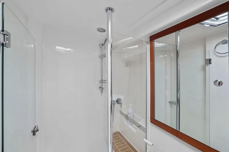 Slide: The Image of Luxurious bathroom in 2016 Riviera 43 Open Flybridge yacht with modern shower design. - 49