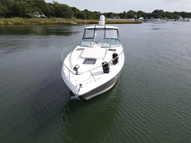 Slide: The Image of 2007 Chaparral Signature 350 on calm water. - 10