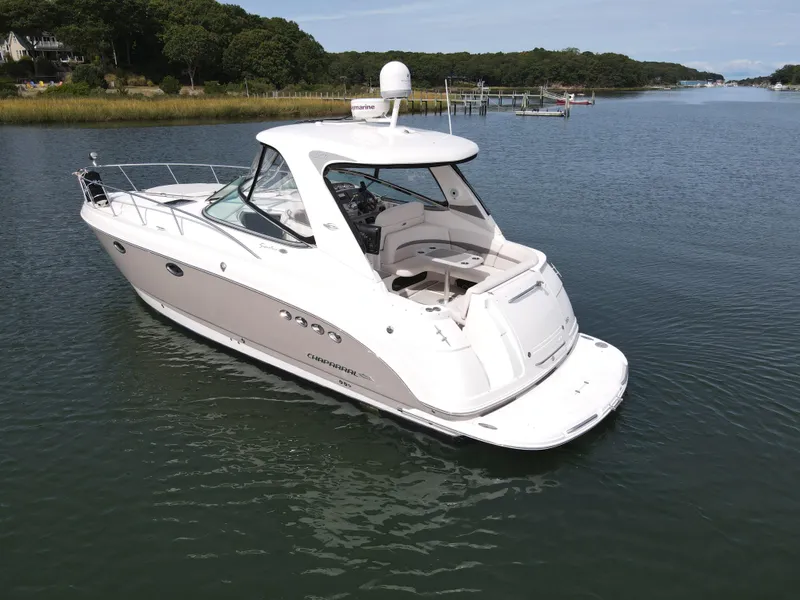 Slide: The Image of 2007 Chaparral Signature 350 yacht on calm waters. - 12