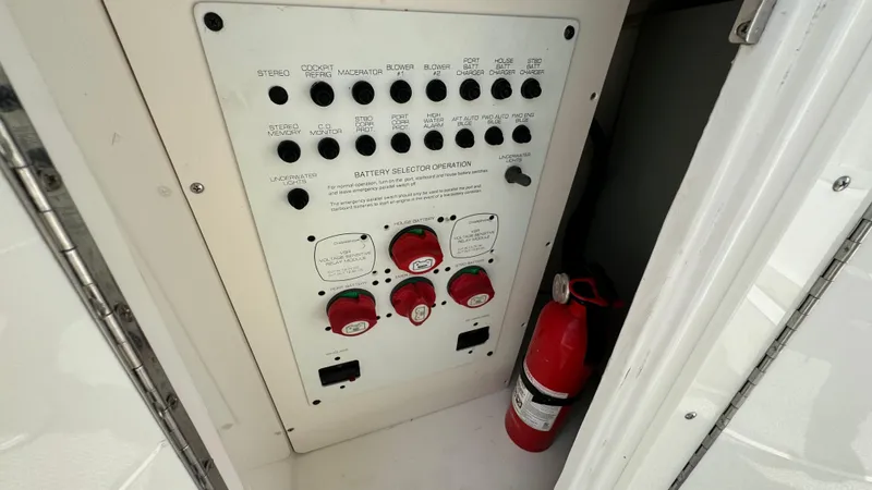 Slide: The Image of Electrical control panel and fire extinguisher on 2007 Chaparral Signature 350. - 22