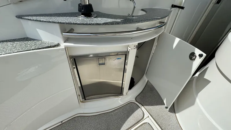 Slide: The Image of 2007 Chaparral Signature 350 interior with fridge and sink. - 23