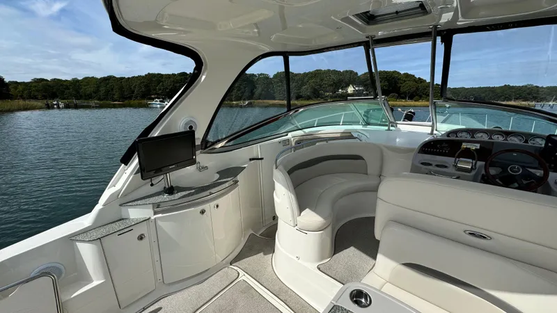 Slide: The Image of Interior of a 2007 Chaparral Signature 350 yacht with sleek furnishings. - 24
