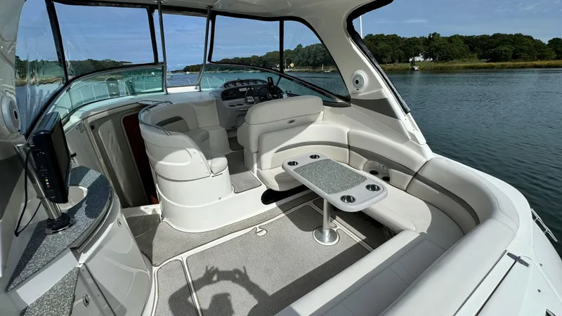 Slide: The Image of Interior of a 2007 Chaparral Signature 350 yacht on calm waters. - 26