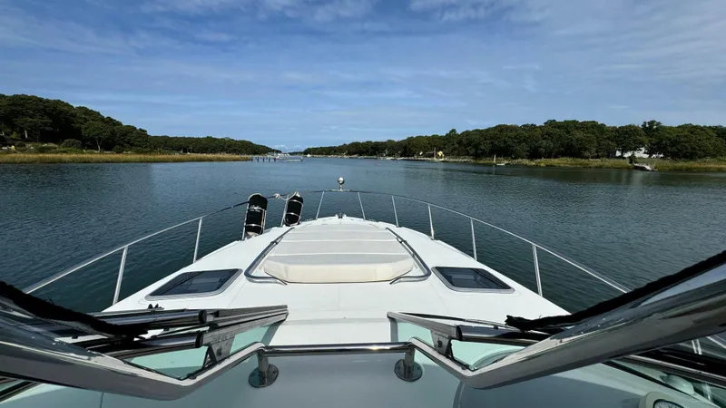 Slide: The Image of 2007 Chaparral Signature 350 on a calm river with wooded banks. - 36