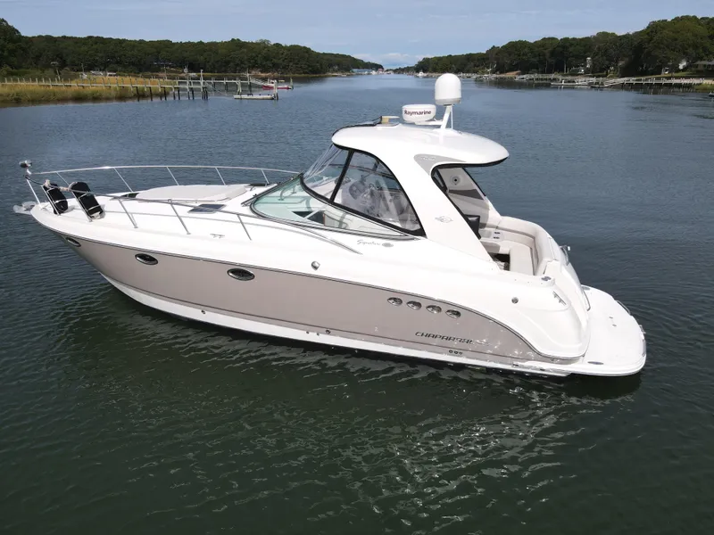 Slide: The Image of 2007 Chaparral Signature 350 yacht on a calm river. - 4