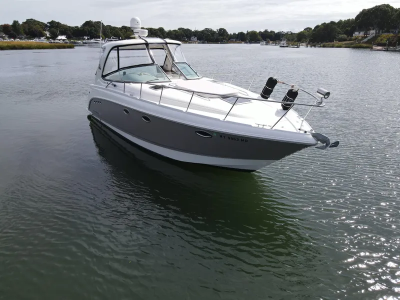 Slide: The Image of 2007 Chaparral Signature 350 boat on calm water. - 9