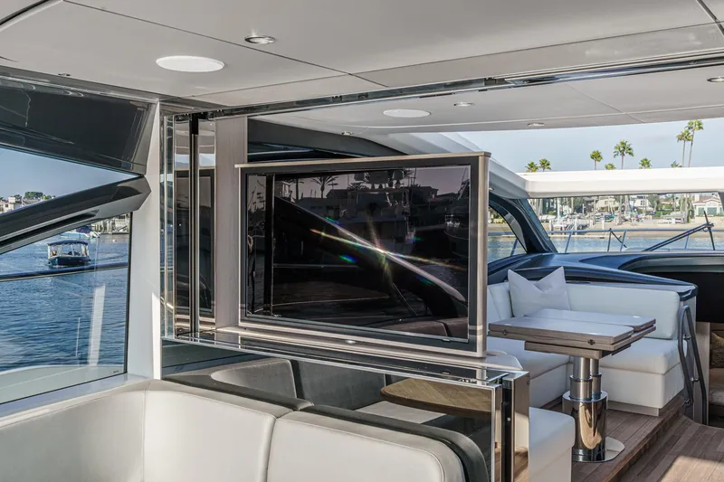 Slide: The Image of Luxurious interior of 2026 Princess V55 yacht with modern seating and waterfront view. - 10