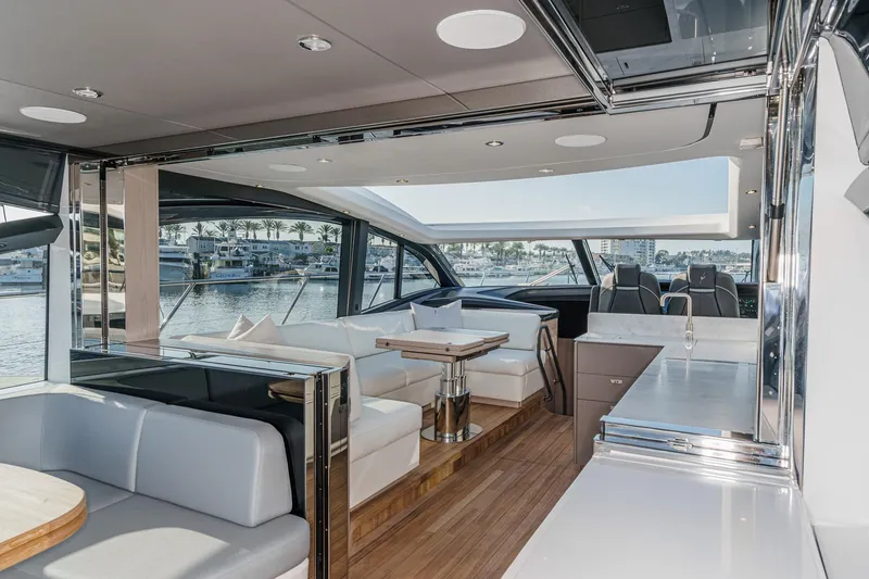 Slide: The Image of Luxurious interior of 2026 Princess V55 yacht with modern seating and sleek design. - 25