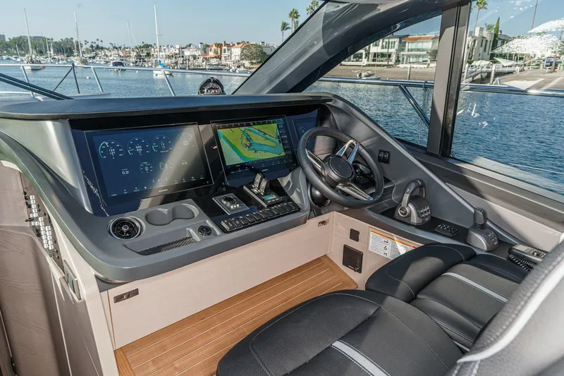 Slide: The Image of Interior cockpit of 2026 Princess V55 yacht with advanced navigation displays. - 35
