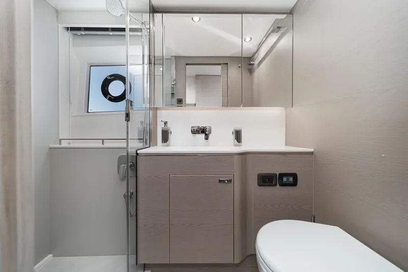 Slide: The Image of Modern bathroom interior on 2026 Princess V55 yacht, featuring sleek design and elegant fixtures. - 41