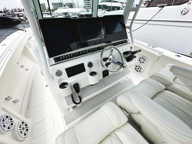 Slide: The Image of 2018 HCB 39 Speciale boat cockpit with modern controls and luxurious seating. - 20