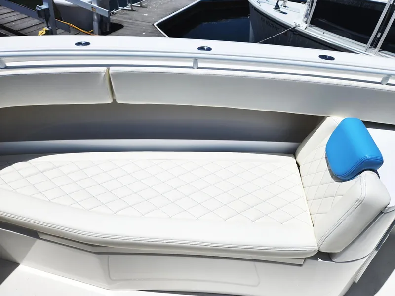 Slide: The Image of Luxurious seating on a 2018 HCB 39 Speciale boat with quilted upholstery. - 32