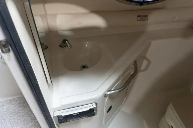 Slide: The Image of Interior sink area of 2002 Sea Ray 270 Sundeck boat. - 24