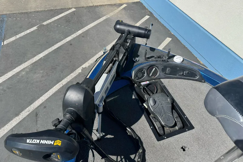 Slide: The Image of 2000 Nitro 901 CDX DC boat deck with Minn Kota trolling motor and control panel. - 12