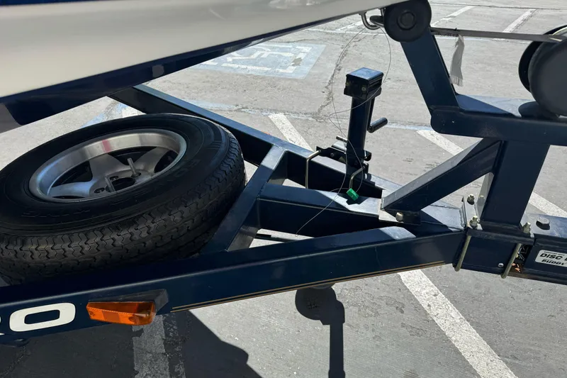 Slide: The Image of Trailer hitch and spare tire of a 2000 Nitro 901 CDX DC boat. - 6