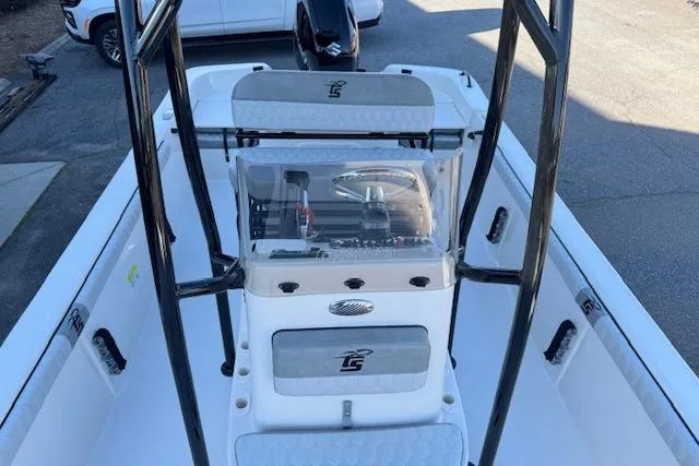 Slide: The Image of 2026 Carolina Skiff 21 LS boat interior with steering console and seating. - 8