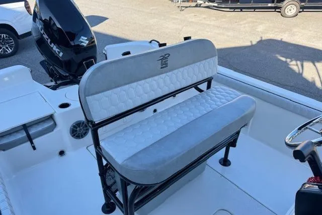 Slide: The Image of 2026 Carolina Skiff 21 LS boat interior with seating and motor. - 9