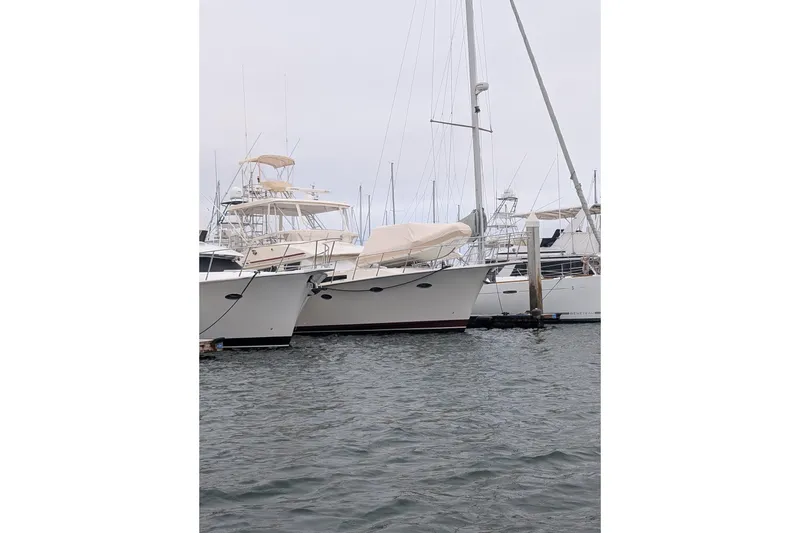 Slide: The Image of Boats docked at marina, featuring 2026 Tide Craft Catalina 13. - 13