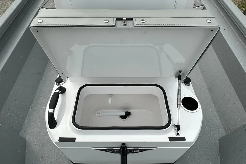 Slide: The Image of Open storage compartment in 2026 Vexus Defender 201 boat, featuring sleek design and functionality. - 16