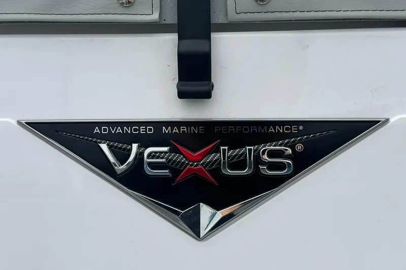 Slide: The Image of Vexus Defender 201 emblem showcasing advanced marine performance, 2026 model. - 17